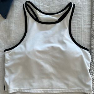 White Fabletics midi sports bra